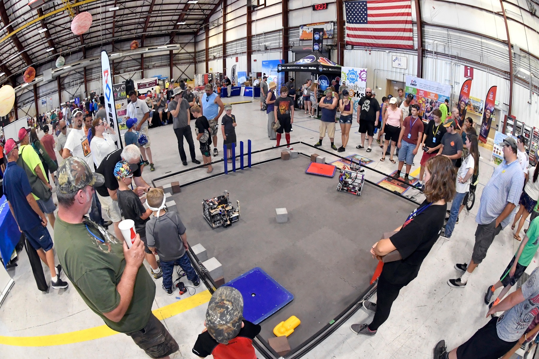 People watching robot competition People watching robot competition